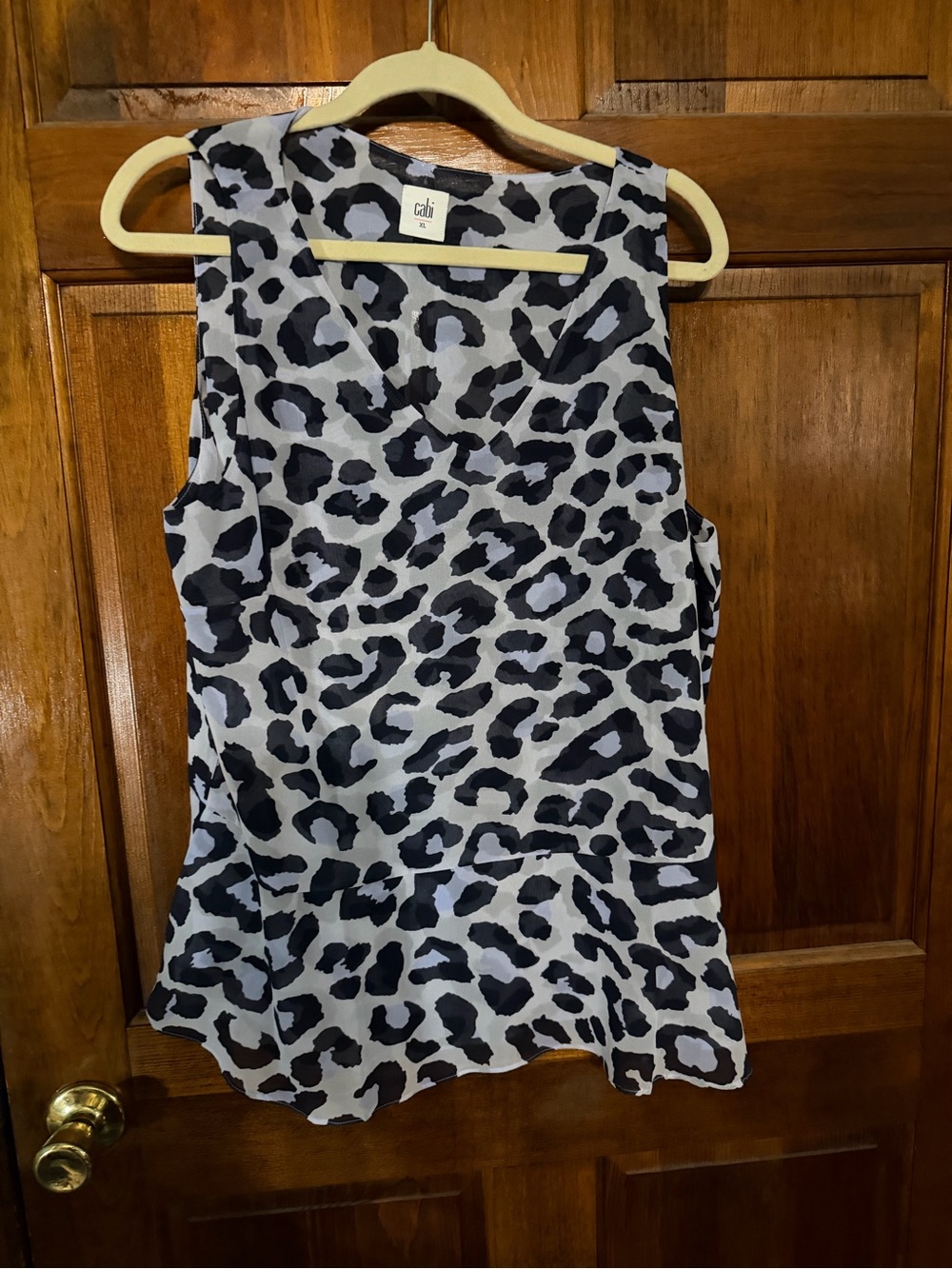 CAbi Sleeveless Leopard Peplum Top in Black and Gray